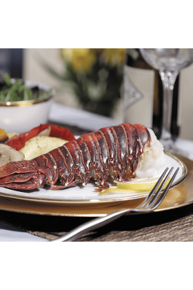 Two Australian lobster tails displayed on a clean surface.