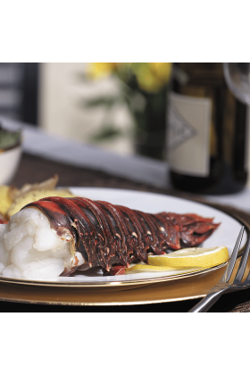 Two Australian lobster tails displayed on a clean surface.